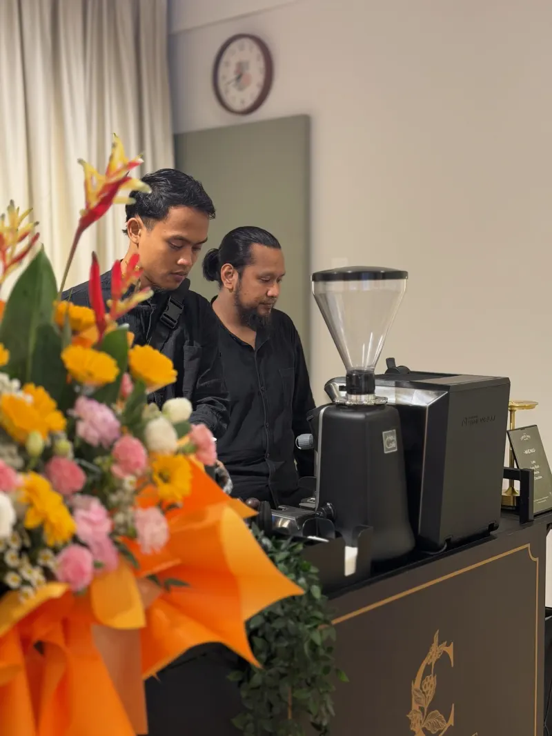 A coffee cart serving guests during the open house